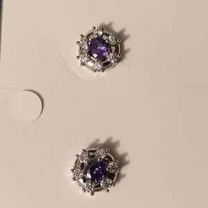 Petite silver tone earrings.